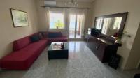 TV a/nebo společenská místnost v ubytování Platanidia Apartment Pelion