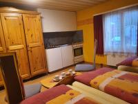 Postel nebo postele na pokoji v ubytování Hotel Klein Matterhorn