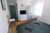 Televízia a/alebo spoločenská miestnosť v ubytovaní Alle Bed & Breakfast