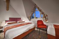 Postel nebo postele na pokoji v ubytování Maxmilian Lifestyle Resort