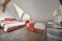Postel nebo postele na pokoji v ubytování Maxmilian Lifestyle Resort