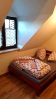 Posteľ alebo postele v izbe v ubytovaní Apartamenty Jagusia