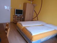 Postel nebo postele na pokoji v ubytování Hotel Klein Matterhorn