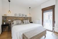 Postel nebo postele na pokoji v ubytování Casa Paredes, Bronchales