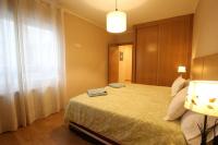 Postel nebo postele na pokoji v ubytování Apartamento Oviedo Foncalada