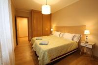 Postel nebo postele na pokoji v ubytování Apartamento Oviedo Foncalada