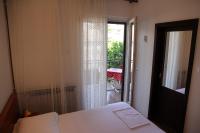 Posteľ alebo postele v izbe v ubytovaní Obradović rooms & apartments