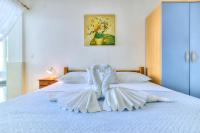 Posteľ alebo postele v izbe v ubytovaní Ivan apartman