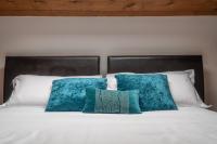 A bed or beds in a room at San Marco View Terrace Apartment R&R