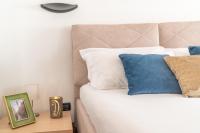 A bed or beds in a room at San Marco View Terrace Apartment R&R