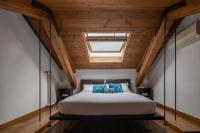 A bed or beds in a room at San Marco View Terrace Apartment R&R