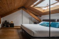 A bed or beds in a room at San Marco View Terrace Apartment R&R