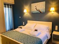 Postel nebo postele na pokoji v ubytování Villa Marietta