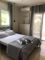 Posteľ alebo postele v izbe v ubytovaní georgia's cozy rooms #3