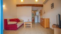 Televízia a/alebo spoločenská miestnosť v ubytovaní Holiday Home Grimalda