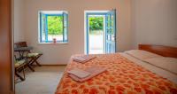 Posteľ alebo postele v izbe v ubytovaní Holiday Home Grimalda