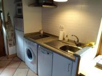 Kuchyň nebo kuchyňský kout v ubytování Apartamento Aguas del Sella