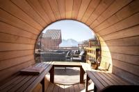 an inside view of a sauna with a table and a window at Grandes Rousses Hotel &amp; Spa in L&#39;Alpe-d&#39;Huez