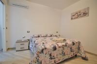 Posteľ alebo postele v izbe v ubytovaní B&B Canavaccio