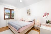 Łóżko lub łóżka w pokoju w obiekcie Apartment Jasna Punat