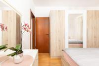 Łóżko lub łóżka w pokoju w obiekcie Apartment Jasna Punat