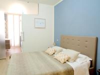 Posteľ alebo postele v izbe v ubytovaní B&b La Rocca