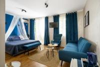 Postel nebo postele na pokoji v ubytování Sunrise Hotel