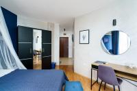 Postel nebo postele na pokoji v ubytování Sunrise Hotel