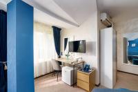 TV a/nebo společenská místnost v ubytování Sunrise Hotel