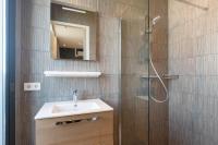 Een badkamer bij BizStay Maurits