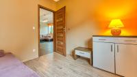 Posteľ alebo postele v izbe v ubytovaní Apartamenty Cicha by Royal Aparts