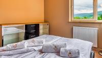 Posteľ alebo postele v izbe v ubytovaní Apartamenty Cicha by Royal Aparts