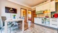 Kuchyňa alebo kuchynka v ubytovaní Apartamenty Cicha by Royal Aparts