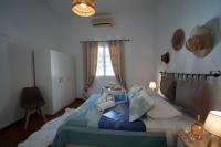 Posteľ alebo postele v izbe v ubytovaní Iviskos House Apollonia Sifnos