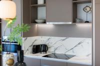 Een keuken of kitchenette bij BizStay Maurits