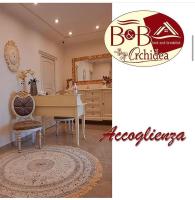 A kitchen or kitchenette at B&B Orchidea