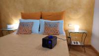 Posteľ alebo postele v izbe v ubytovaní La Locandiera B&B