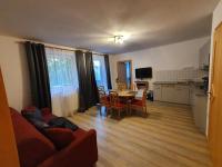 A television and/or entertainment centre at Glemmy Appartements inkl Sommercard