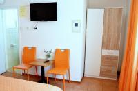 TV a/nebo společenská místnost v ubytování Rooms Vilma close to Rab City