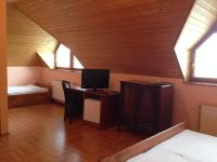 Telewizja i/lub zestaw kina domowego w obiekcie Juhász Fogadó