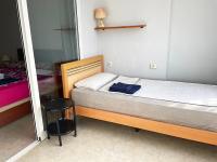 A bed or beds in a room at Apartament BAMBU N°2 przy plaży PIĘKNY WIDOK