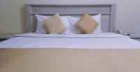 Postel nebo postele na pokoji v ubytování Al Khaleej Plaza Furnished Apartments LLC