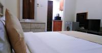Postel nebo postele na pokoji v ubytování Al Khaleej Plaza Furnished Apartments LLC