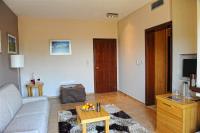 A television and/or entertainment centre at Pilion Terra Hotel