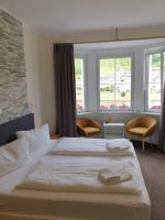 Postel nebo postele na pokoji v ubytování Haus Burgfrieden Cochem