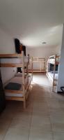 Postel nebo postele na pokoji v ubytování Albergue La Costana