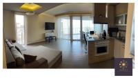 Kuchyňa alebo kuchynka v ubytovaní Rising Sun Panorama Apartman I