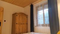 Posteľ alebo postele v izbe v ubytovaní Bieszczady Domek Nad Stawem