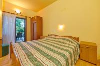 Posteľ alebo postele v izbe v ubytovaní Apartment Banjole 2