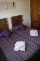 Postel nebo postele na pokoji v ubytování Vivienda Turistica El Caneco